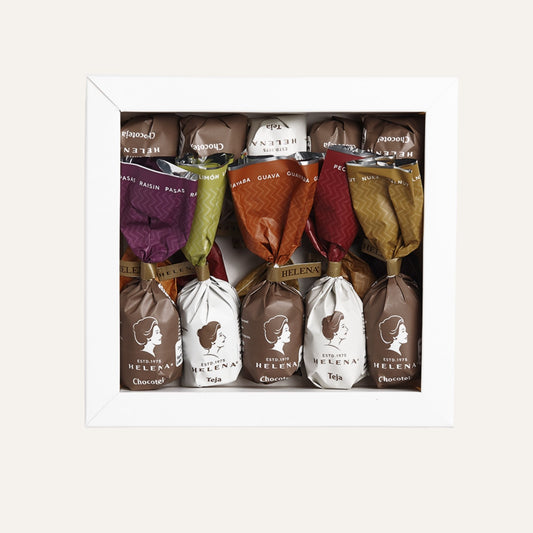 Assorted Helena Chocoteja and Teja Bonbons in white display box showing colorful wrappers with flavor labels