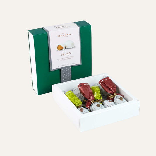 Assorted Helena Teja Fondant Bonbons 8-unit display on marble with wrappers