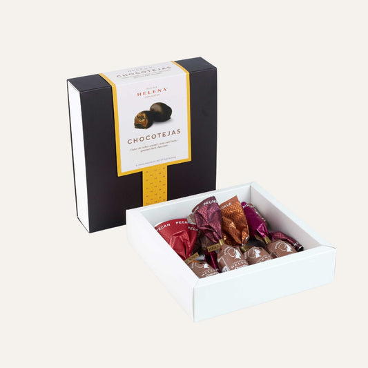 Assorted Helena Chocoteja Bonbons 8-unit display on marble with wrappers