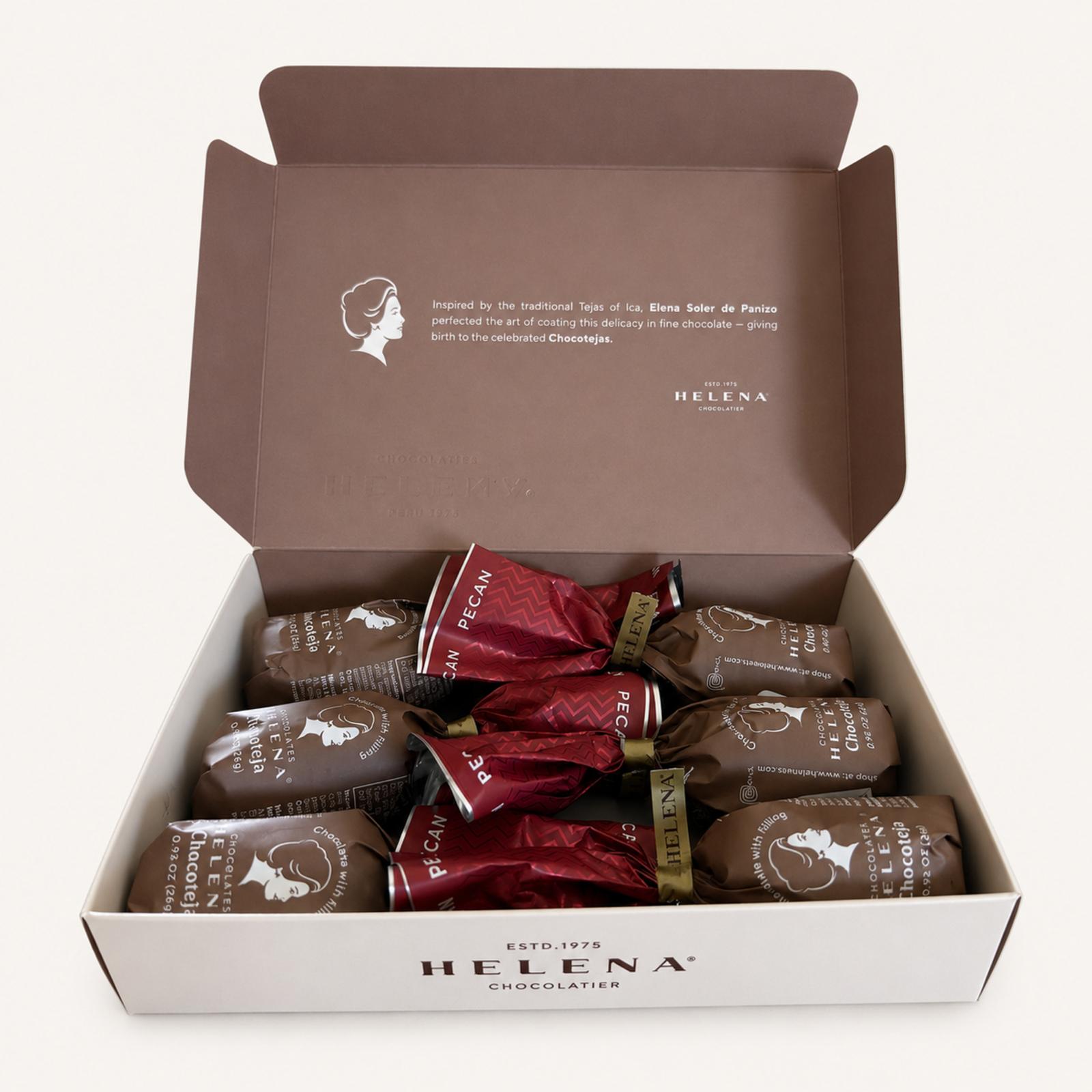 Open Helena Chocolatier gift box with 6 individually wrapped Pecan Chocoteja Bonbons in red and brown foil wrappers, white background