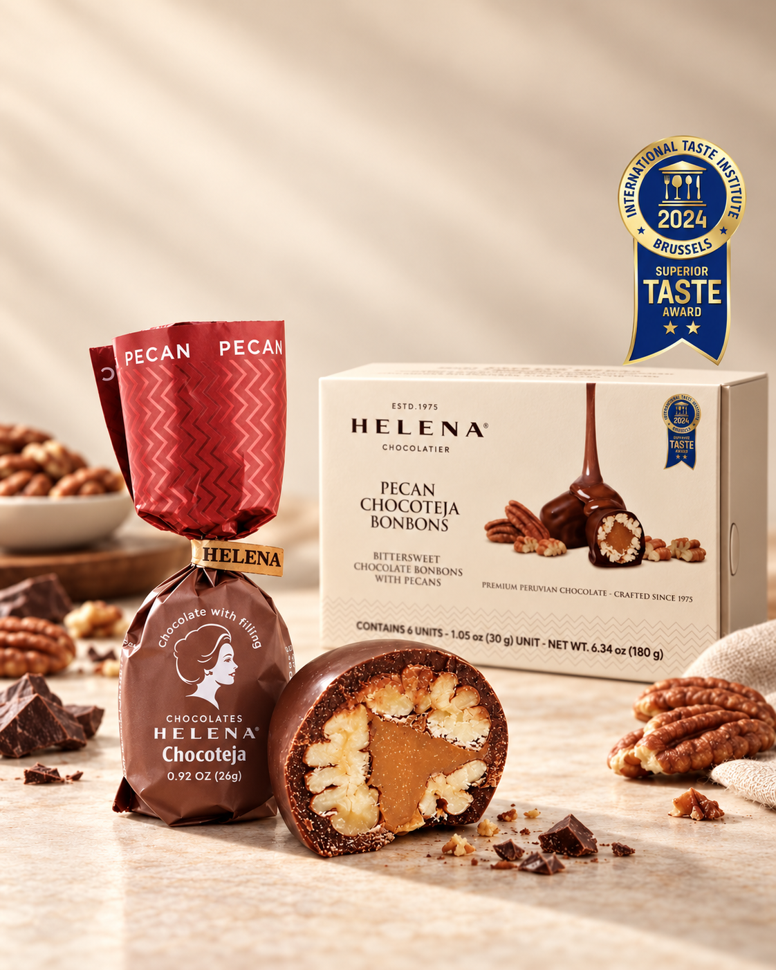 Helena Pecan Chocoteja Bonbons mobile hero with box, cut bonbon and award